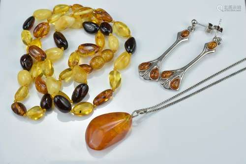 Amber bead necklace together with a pair of silver and