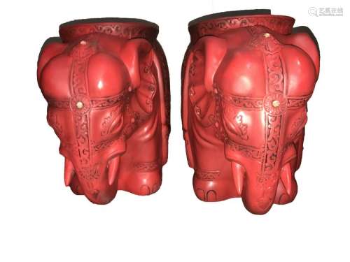 A Pair of Chinese Red Elephant Stools