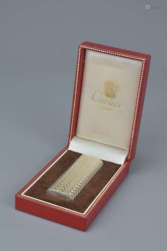 A Cartier Paris silver-plated lighter in original