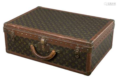 A classic Vintage Louis Vuitton Paris travel suitcase,