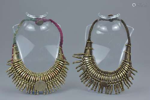 Two Indian 20th century white metal necklaces with