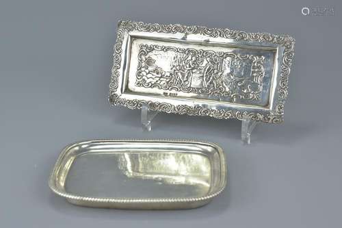 A late Victorian sterling silver tray with man and