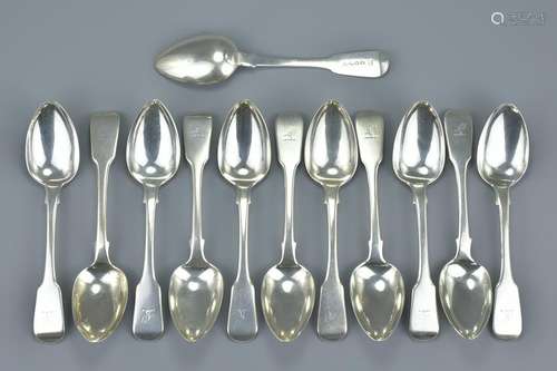 Set of twelve English antique George IV solid silver