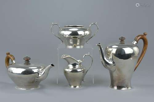 A rare English antique William IV four piece silver tea