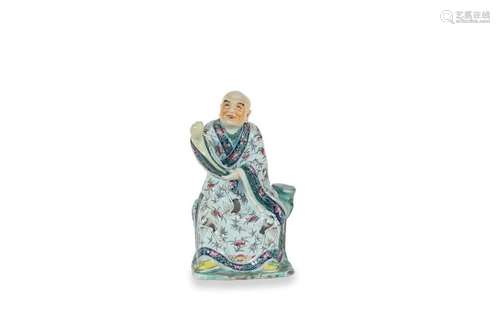 CHINE, XIXe siècle Personnage en porcelaine assis …