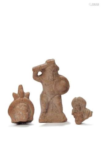 Lot including a statuette of the god Bes standing,…