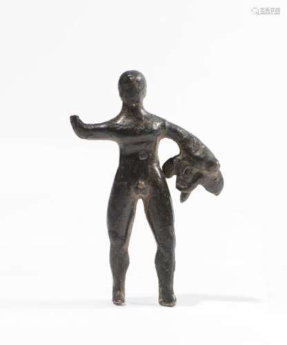 Figurine of naked Hercules holding the leonte. He …