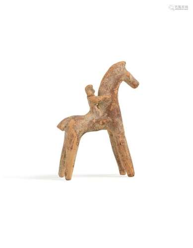 Stylized horseman figure. \n \n \nBeige terracotta wi…