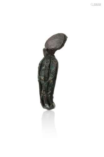 Figurine of Uraeus carrying the solar disc. Caviti…