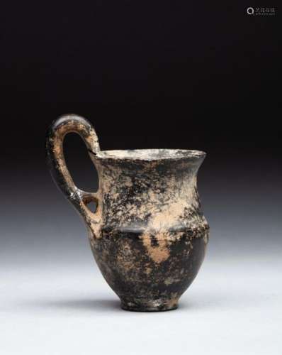 Jug with globular rumen and high concave neck. \n \n…