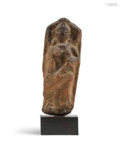 Terracotta stele \n \nrepresenting a standing deity …