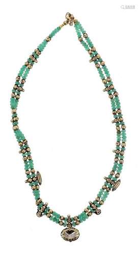 Short necklace on two rows composed of small facet…