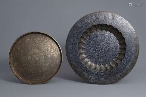 Two large hammered and silver inlaid brass dishes,...