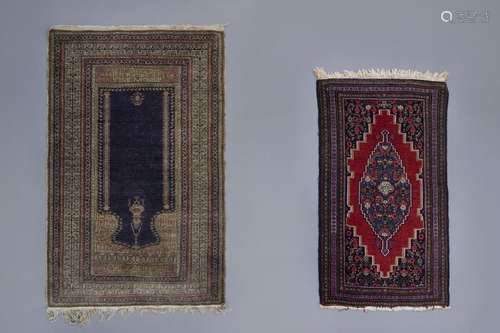 Two Oriental prayer rugs with verses, wool and sil...