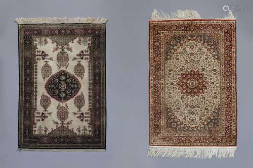 Two Oriental rugs with floral design, birds and a ...