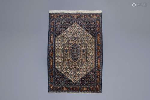 An Oriental rug with different designs, wool on co...