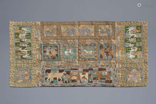 A decorative Indian wool wall tapestry with huntin...