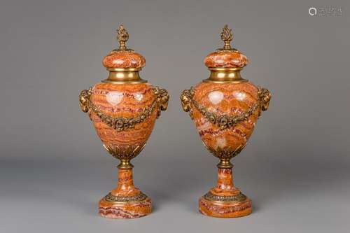 A pair of Neoclassical gilt bronze mounted Breccia...