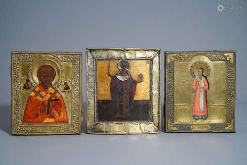 Three Russian icons, 'Saint Nicholas', with copper...