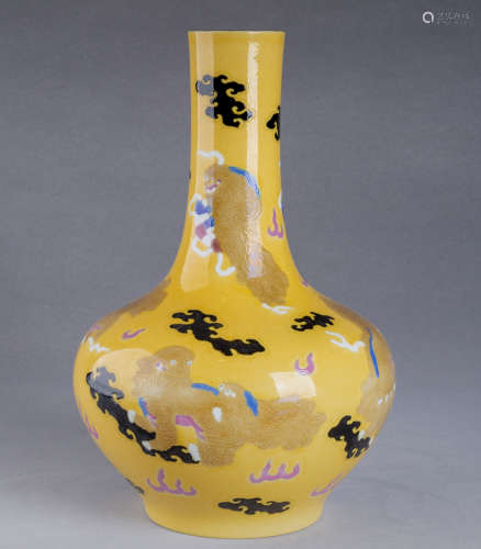 A Chinese Yellow Ground Carved Porcelain Vase