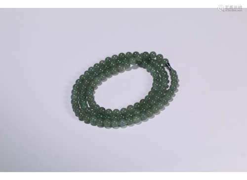 A Chinese Natural Jadeite Necklace Hand String
