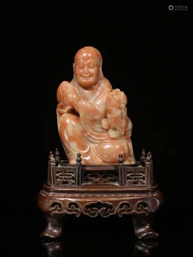 A Chinese Carved Shoushan Ross Quartz Ornament