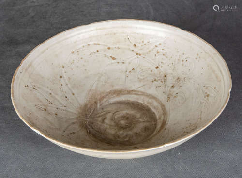 A Chinese Carved Ding Kiln Porcelain Bowl