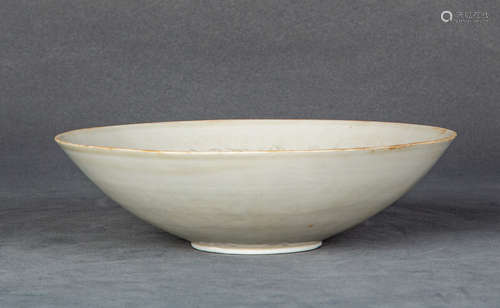 A Chinese Carved Ding Kiln Porcelain Bowl