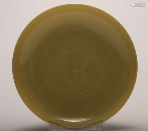 A Chinese Yellow Glazed Carved Porcelain Plate