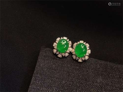 A Pair of Chinese Carved Jadeite Earrings