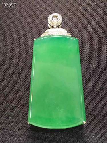 A Chinese Carved Jadeite Pendant