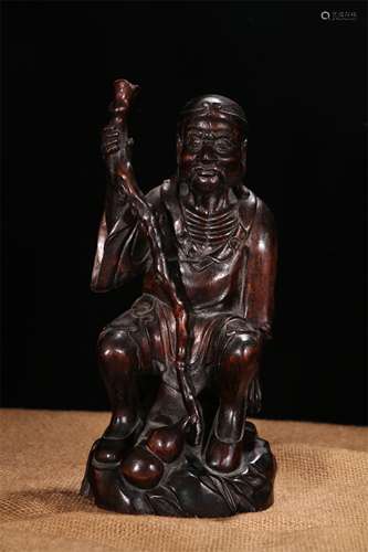 A Chinese Carved Agar-Wood Figure Statue