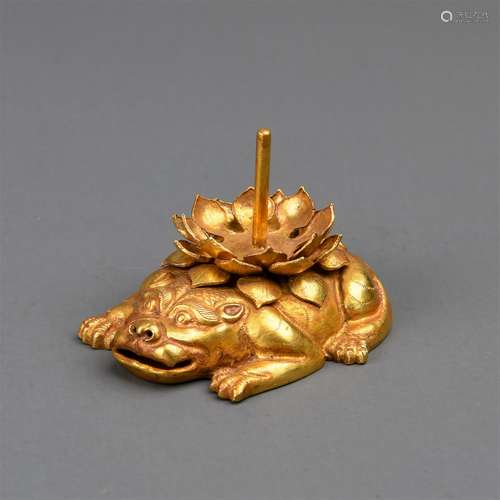 A Chinese Caved Golden Candle Holder