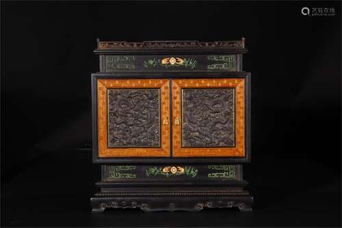 A Chinese Carved Hardwood Cabinet