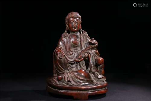 A Chinese Carved Agar-Wood Figure of Buddha