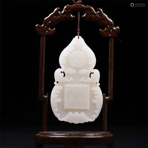 A Chinese Carved Jade Double Gourd Pendant