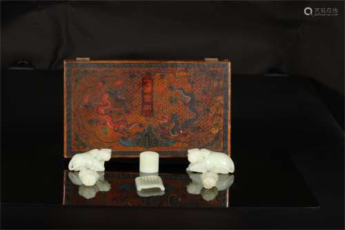 A Set of Six Chinese Caved Jade Decorations