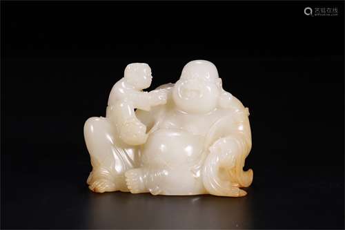 A Chinese Carved Jade Figure of Buddha