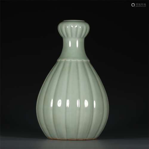 A Chinese Pea Green Glazed Porcelain Vase