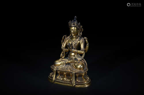 Qing dynasty Qianlong gilt-bronze figure of Guanyin with four arms