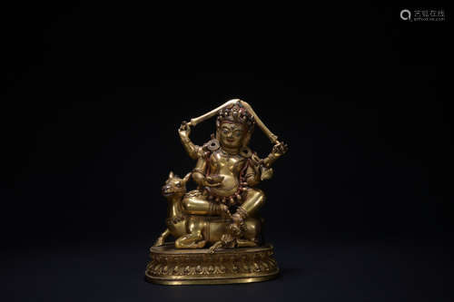 The 17th century gilt bronze statue of Mahakala with 4 arms