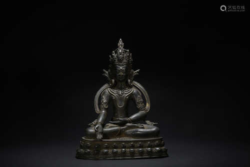 The 17th century bronze inlaid with silver statue of the Akshobhya Buddha