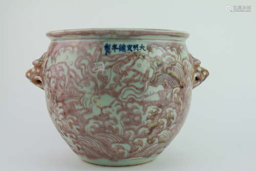 Ming dynasty underglaze red jar with dragons and seawater pattern