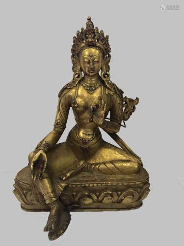 A Gilt Bronze Figure of Green Tara, Tibet, 17 - 18th Century.