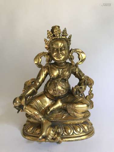 A Gilt Bronze Figure of Jambhala, China, 17 - 18th Century.