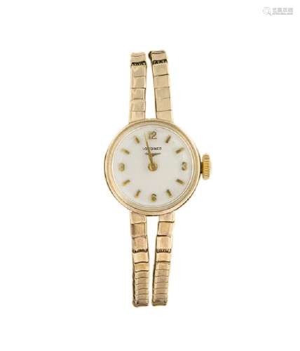A lady's 9ct gold manual wind wristwatch, by Longines, the circular white dial with applied numerals