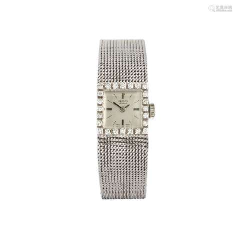 A 9ct white gold and diamond wristwatch, by Record, the silvered square dial with applied baton