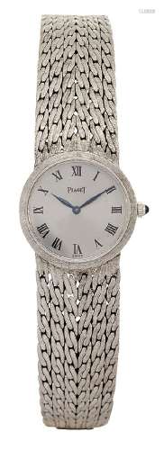 A lady's 18ct white gold wristwatch by Piaget, the circular silvered dial with Roman numerals to a