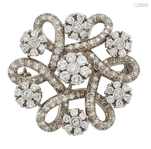 A diamond brooch, of single-cut diamond looped hexafoil design set with a series of brilliant-cut