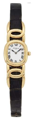 An 18ct gold 'Ellipse' quartz wristwatch Ref 4830J-001 by Patek Philippe, the oval white dial with